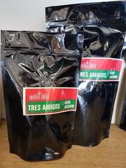 Tres Amigos - Medium (Café Noel) coffee beans.